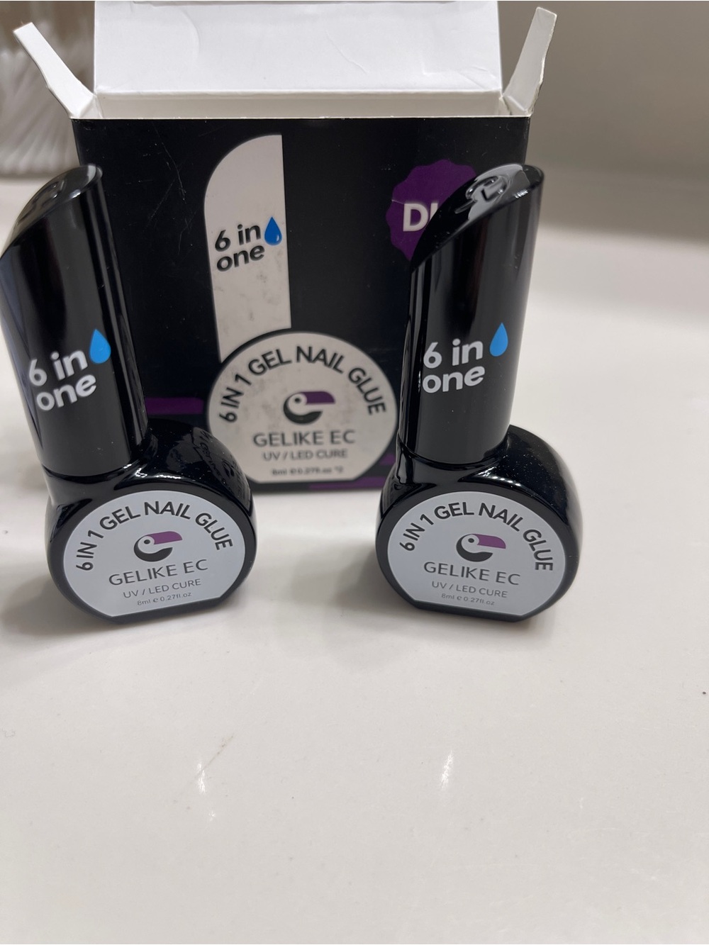 6-in-1 Gel Nail Glue - Black Bottle
